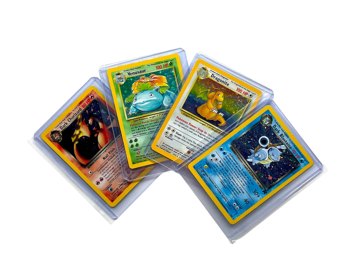 Vintage Pokémon singles med Charizard, Blastoise, Erika’s Venusaur, Rocket’s Mewtwo og Pikachu