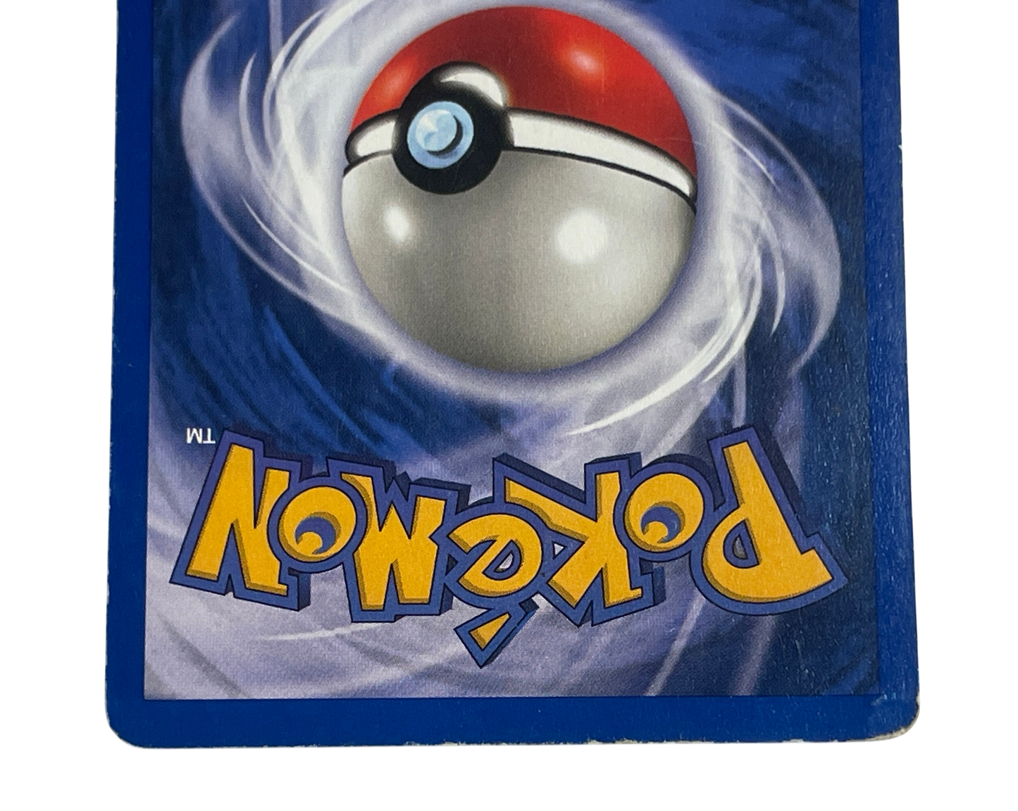 Charizard 4/102 Holo fra Pokémon Base Set – nærbillede af bagsidens nederste kant og hjørner