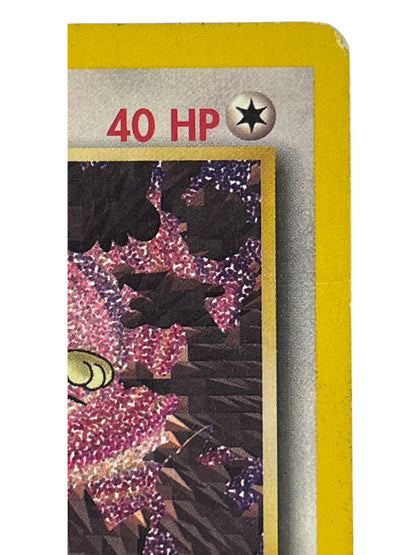 Team Rocket’s Meowth 18 fra Pokémon Wizards Black Star Promos – nærbillede af forsidens øverste højre hjørne med HP og kant